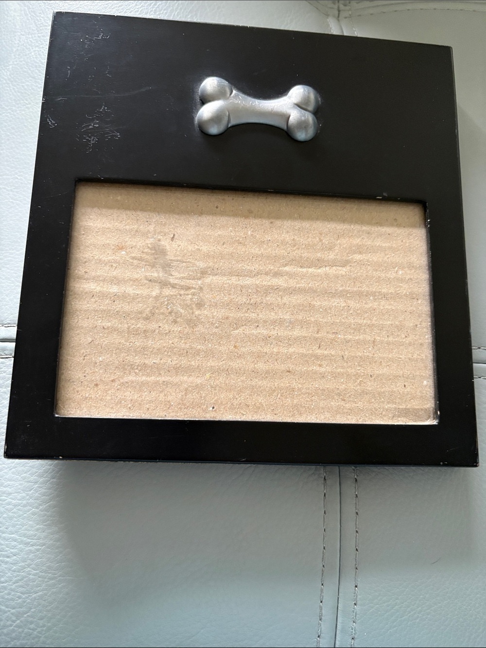 Black Wall Mirror with Silver Bone Accent